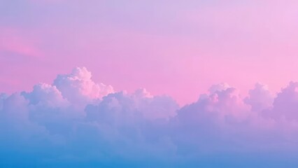 Obraz premium Blue and pink hues merge to create an ombre background with cloud formations, soft gradient, gentle hue