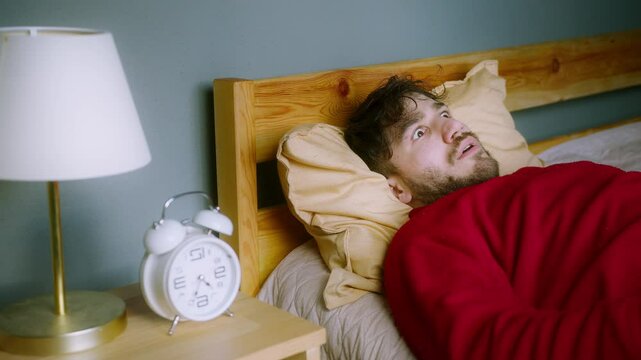 Man Waking Up in Shock After a Nightmare &ndash; Sleep Paralysis or Sleep Apnea Reaction