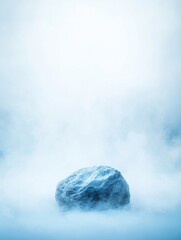 A single, large rock sits in a misty, ethereal environment, creating a surreal and dreamy scene