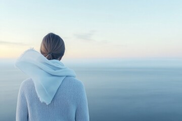 Fototapeta premium minimalistic stock photo of stylish traveler standing on ferry deck gazing at open sea