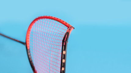 Badminton racket which is broken at the frame from playing by hittting and defending of the players.