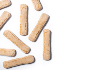 Italian biscuits ladyfingers savoiardi isolated on white background. Top view. Copy space