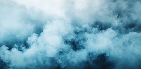 Obraz premium Ethereal Blue Smoke Filling the Air with a Mystical Presence, Perfect for Backgrounds, Artistic Designs, and Atmospheric Effects in Various Projects