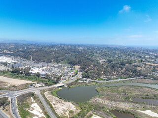 Aerial view of middle class houses in the valley of Oceanside town in San Diego, California. USA.