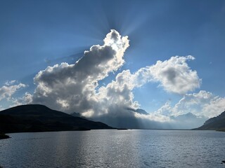 Beautiful photogenic clouds over the Uri Alps massif in the Swiss Alps, Melchtal - Canton of...