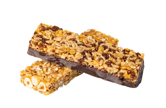 Two cereal bars with chocolate and hazelnuts isolated on transparent background