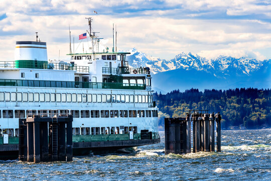 Washington State Ferry Dock Olympic Snow Mountains Edmonds Washington.