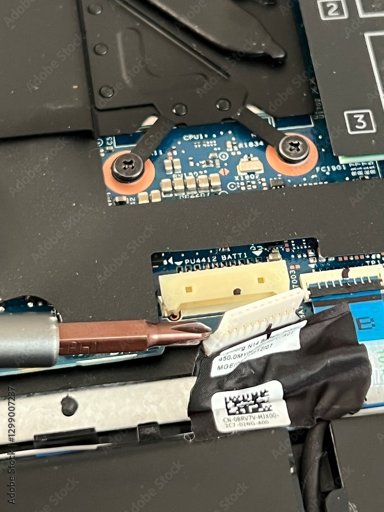 Poster close-up view of computer hardware with a screwdriver. the image captures intricate details of a mot