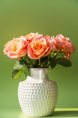 A beautiful bouquet of blooming rose flower in a vase