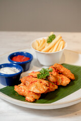 Buffalo chicken fingers served with ranch sauce and celery 4