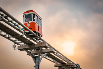 Coastal Monorail on the Sea: a scenic trip along a beach track. A blue rail train trip to Haeundae Cheongsapo, Busan, South Korea.
