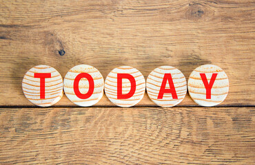 Today symbol. Concept word Today on beautiful wooden circles. Beautiful wooden table wooden...
