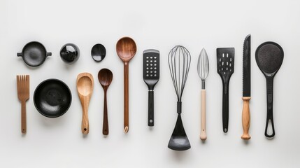 Flat lay of kitchen utensils on a white background with