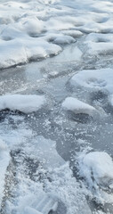 ice on the river. Vertical photo