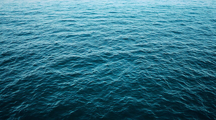 Fototapeta premium Blue Ocean Surface With Gentle Ripples and Subtle Light Reflections