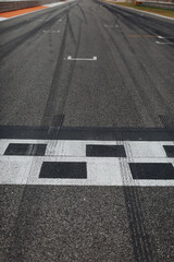 Asphalt racing track finish line side view