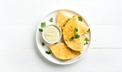 Chicken avocado quesadillas served with sauce
