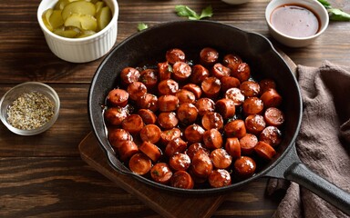 Bbq smoked sausage bites in cast iron skillet