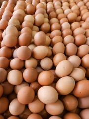A pile of eggs sold at a stall.