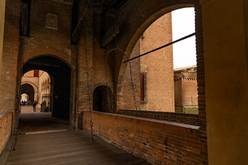 Ferrara, Ferrara,Italy March 29 2024 historic center, fortifications and castle surrounded by a moat. Squares and buildings in medieval style.Beautiful, unique Italian cities. World cultural heritage.