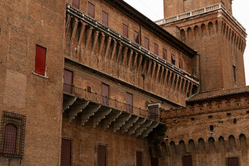 Fototapeta premium Ferrara, Ferrara,Italy March 29 2024 historic center, fortifications and castle surrounded by a moat. Squares and buildings in medieval style.Beautiful, unique Italian cities. World cultural heritage.