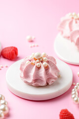 berry marshmallows on a pink background
