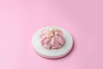 berry marshmallows on a pink background