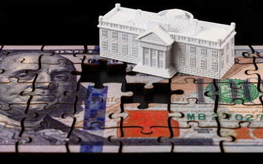 The symbolic residence of the President of the United States, the White House, and a 100 US dollar...