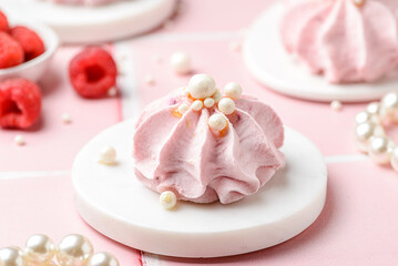 berry marshmallows on a pink background