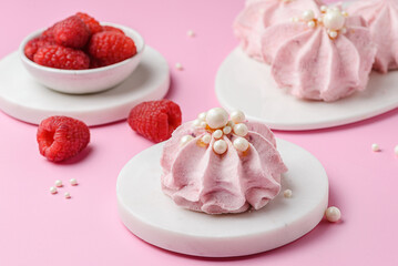 berry marshmallows on a pink background