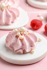 berry marshmallows on a pink background