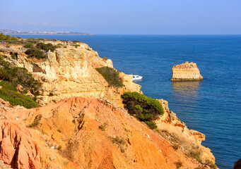 walking path with breathtaking views through the coast from porches to benagil caves lagoa algarve...