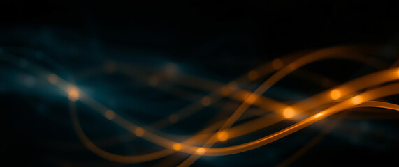 Abstract orange trails of light creating a flowing pattern on a dark background