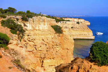 walking path with breathtaking views through the coast from porches to benagil caves lagoa algarve...