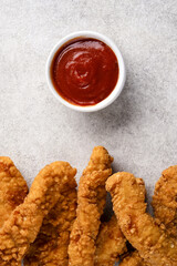 Chicken tenders. Fried chicken breast strips	