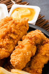 Chicken tenders. Fried chicken breast strips	
