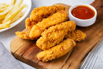 Chicken tenders. Fried chicken breast strips	
