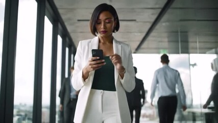 mixed race business woman using smartphone walking through office texting sending emails successful female executive checking messages on mobile phone arriving at busy workplace