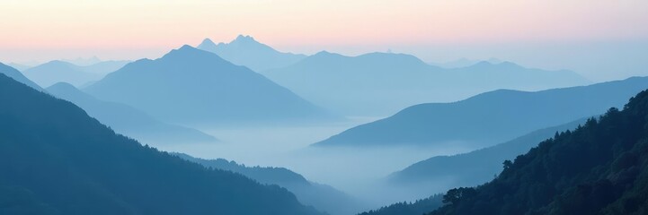 Fototapeta premium A foggy mountain range shrouds its peaks in mist, fog, vastness, peak