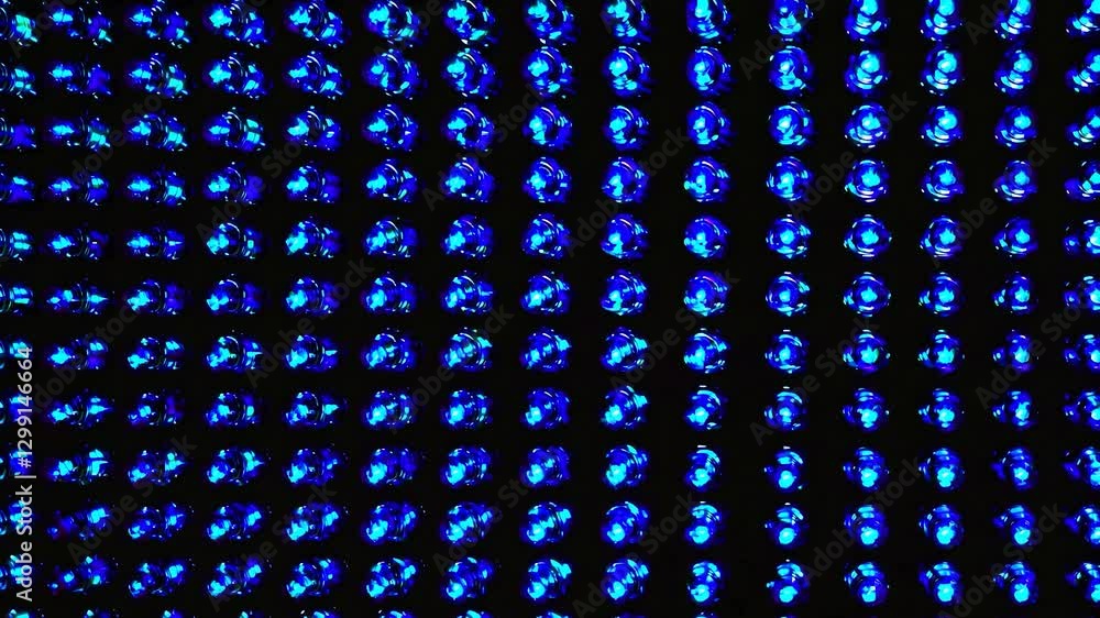 Poster many small blue lights are shining brightly creating a regular grid pattern on a black background, f
