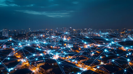 Aerial View Of A Modern City At Night Illuminated With Blue Lights And Network Connections