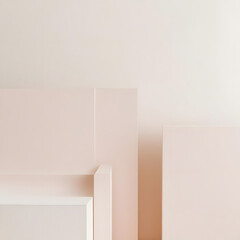 Muted pastel geometric shapes grace the walls and furniture of a minimalist interior, contributing to a serene and calming ambiance that invites relaxation