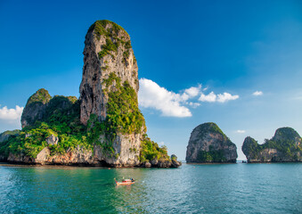 Naklejka premium Tropical paradise of Railay Beach in Phuket with limestone cliffs and crystal waters