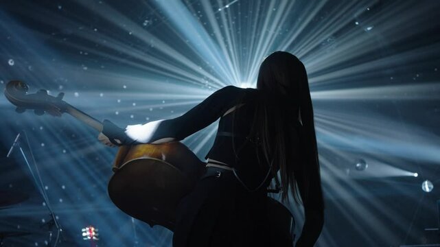 Cello on stage with concert lighting