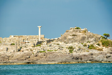 Historic ruins of Basilica St. Stefanos overlooking the Aegean S