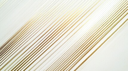 Artistic lines create a dynamic visual effect with varying shades of gold and white on a background that suggests movement and elegance