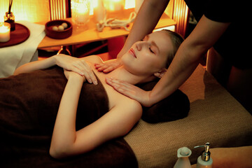 Caucasian woman customer enjoying relaxing anti-stress spa massage and pampering with beauty skin...