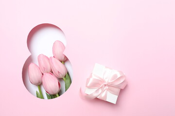 8 March greeting card design with tulip flowers and gift box, top view. Happy International Women's Day