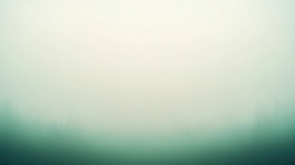 Obraz premium Misty Mountain Landscape: A Tranquil Foggy Morning View