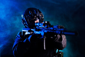 Tactical Operative Aiming in Dynamic Blue and Green Smoke Environment